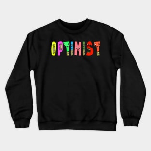 Cute Optimist Motivational Text Illustrated Letters, Blue, Green, Pink for all people, who enjoy Creativity and are on the way to change their life. Are you Confident for Change? To inspire yourself and make an Impact. Crewneck Sweatshirt